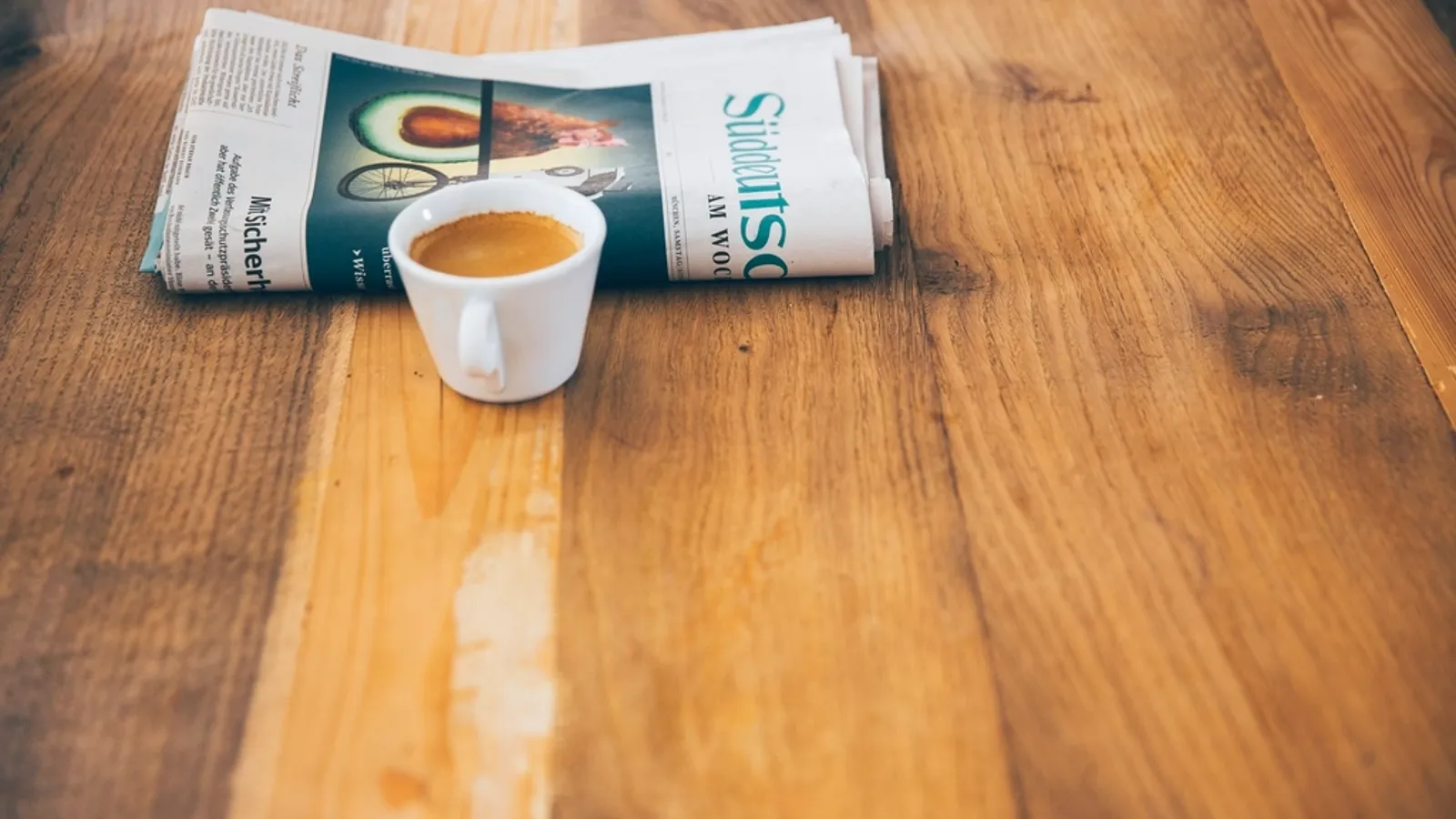 Morning coffee newspaper wooden table
