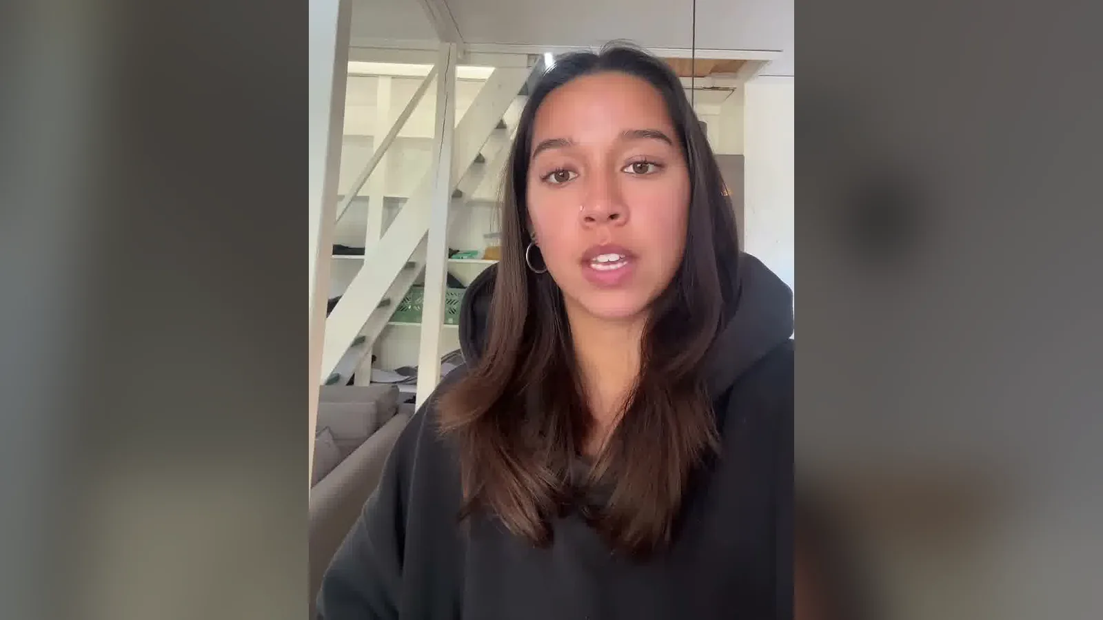 Amber King of @promptedbyamber talking to the camera in one of her Instagram reels.
