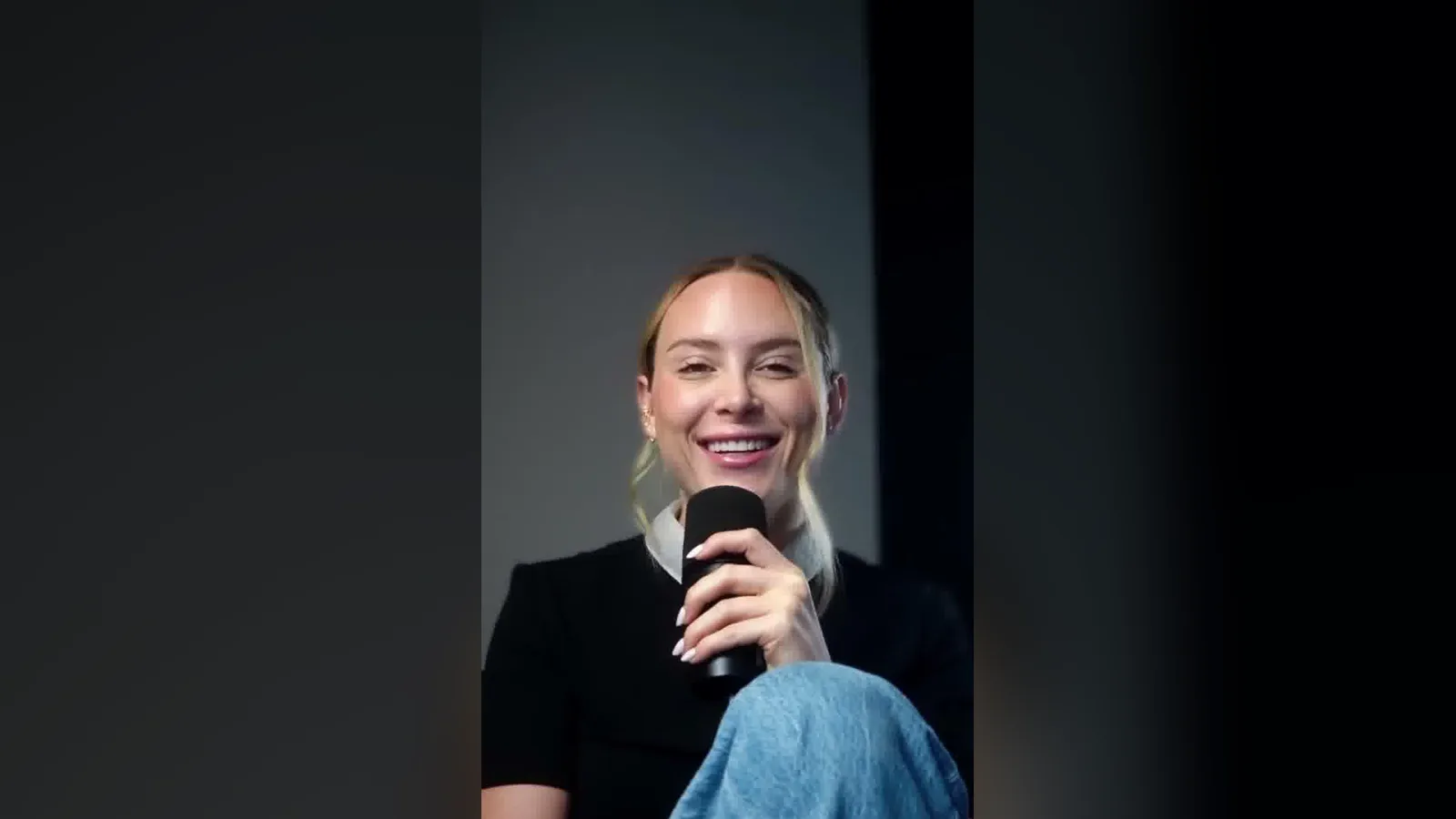 Danielle Lynch of @danidocumented smiling into a microphone while explaining how to sell to different buyers.