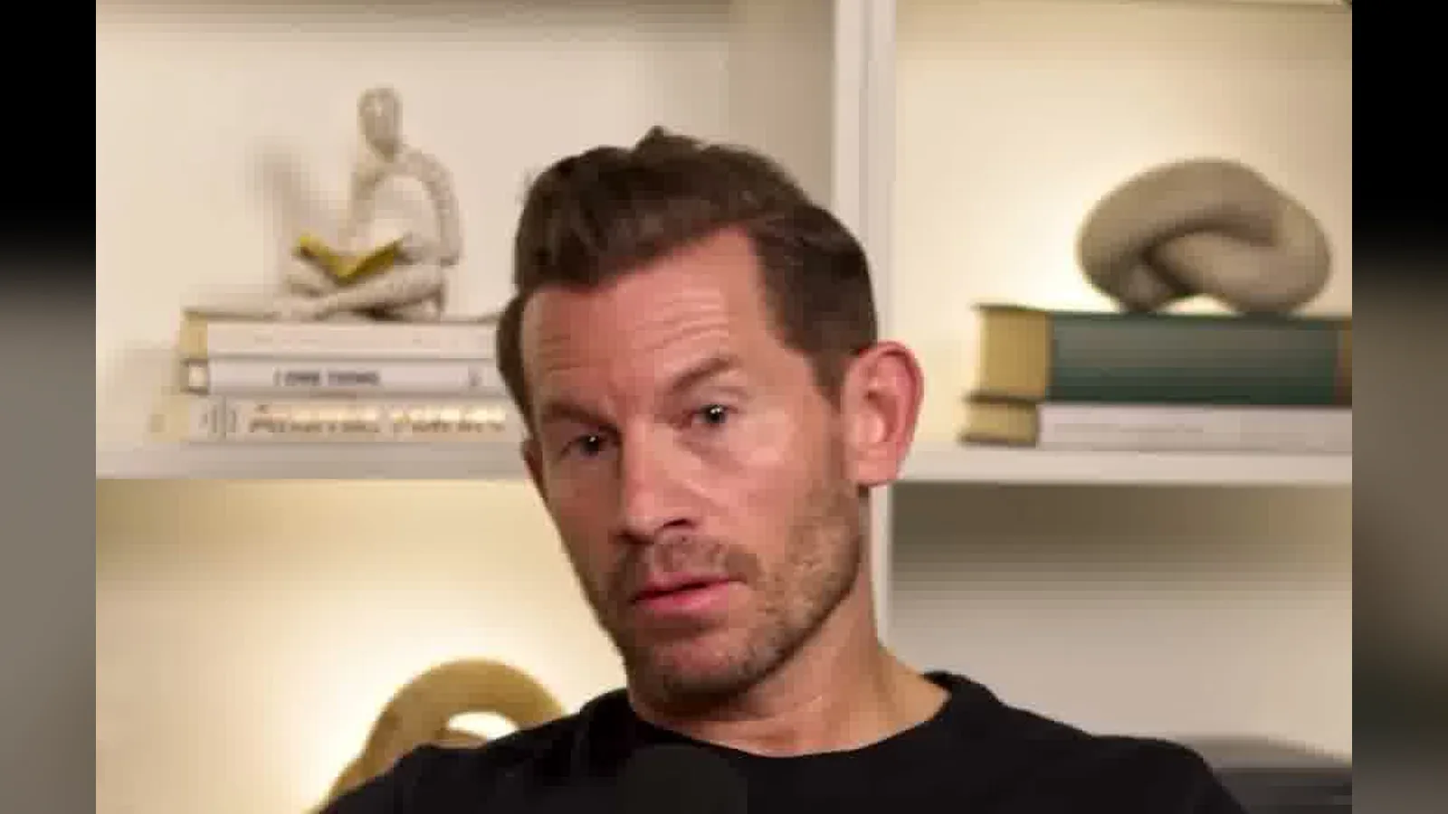 Jeremy Miner in front of a bookshelf explaining Zoom sales call mistakes in an Instagram reel.