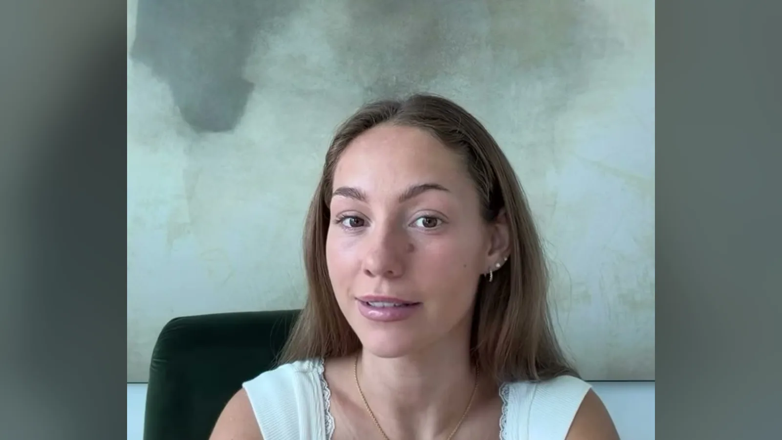 Summer Newman at a desk recording her reintroduction reel about stepping into sales.